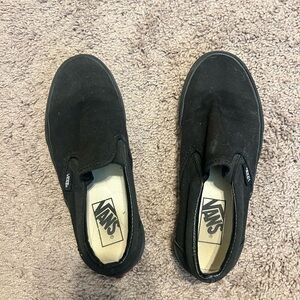 vans black slip ons
